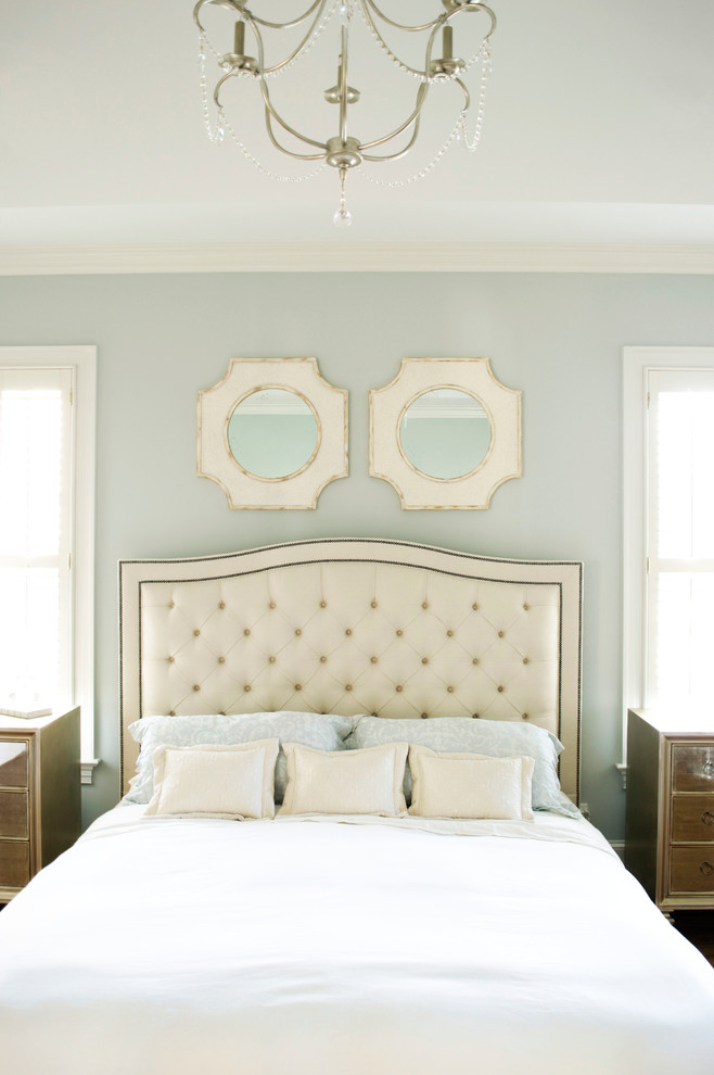 Inspiration for a large transitional master dark wood floor bedroom remodel with green walls