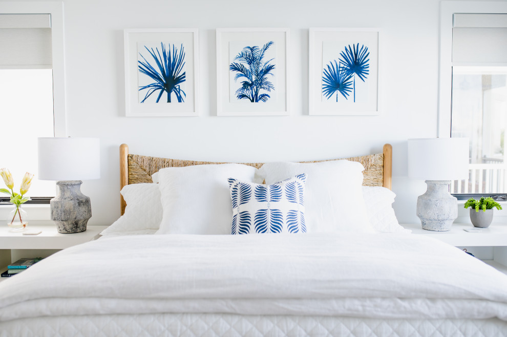 Beach style bedroom in Miami with white walls.