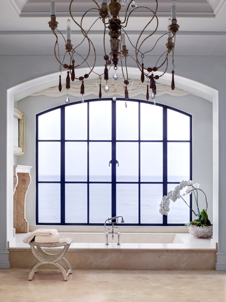 Alcove bathtub - large mediterranean master marble floor and beige floor alcove bathtub idea in Orange County with blue walls
