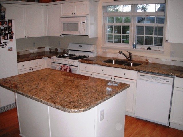 8 20 12 New Venetian Gold Granite With White Cabinets