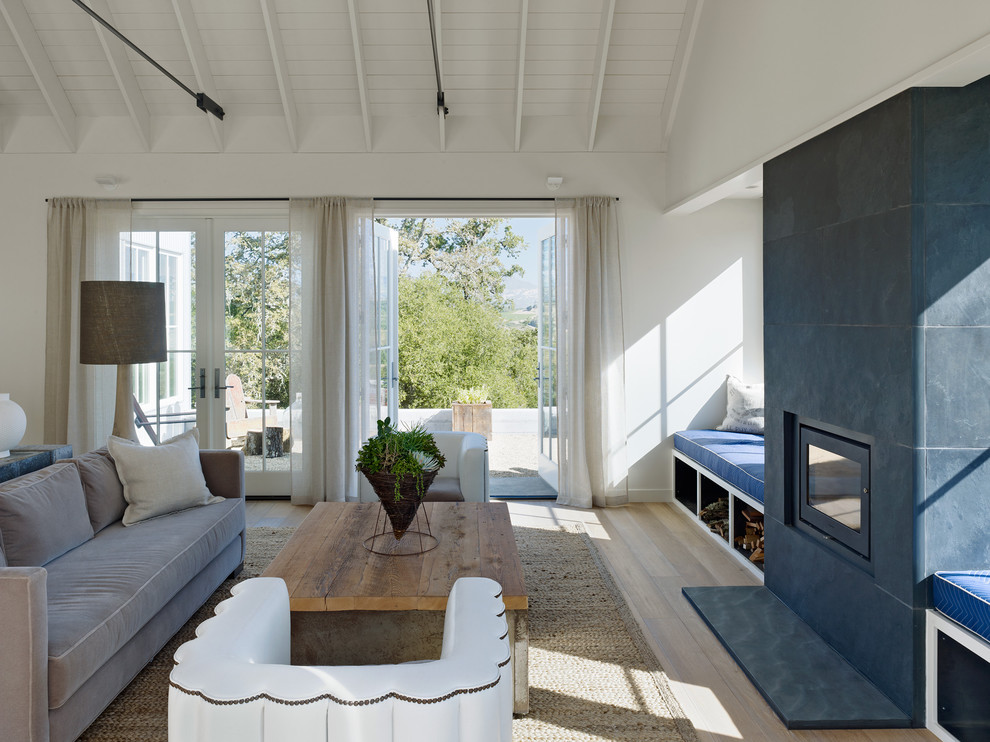 Inspiration for a country living room in San Francisco with white walls.