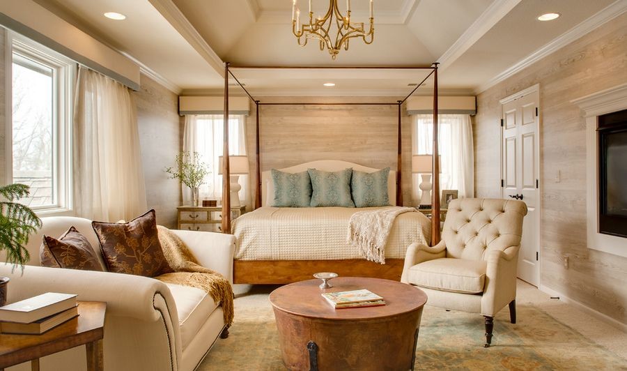 Design ideas for a large traditional master bedroom in Orange County with beige walls, carpet, no fireplace and beige floor.