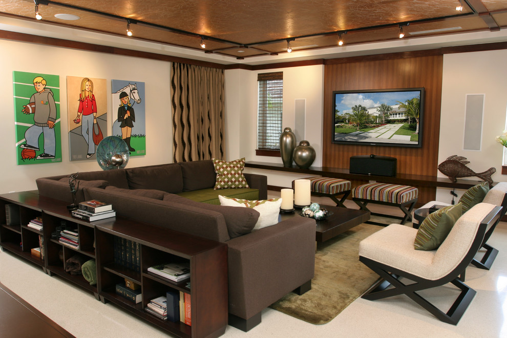 Design ideas for a mid-sized contemporary open concept family room in Miami with beige walls, a wall-mounted tv, linoleum floors, no fireplace and white floor.