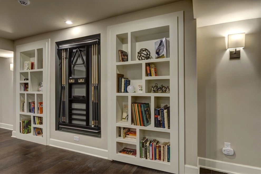 Photo of an expansive contemporary look-out basement in Denver with grey walls, dark hardwood floors, a ribbon fireplace, a tile fireplace surround and brown floor.