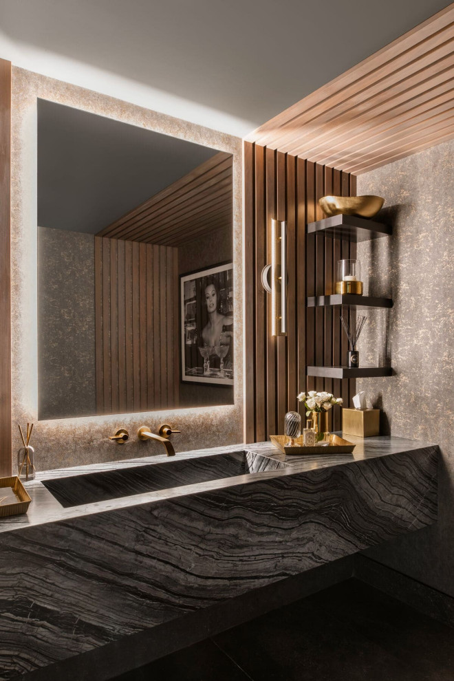Esempio di un bagno di servizio contemporaneo con ante grigie, pareti grigie, lavabo integrato, top grigio e mobile bagno sospeso