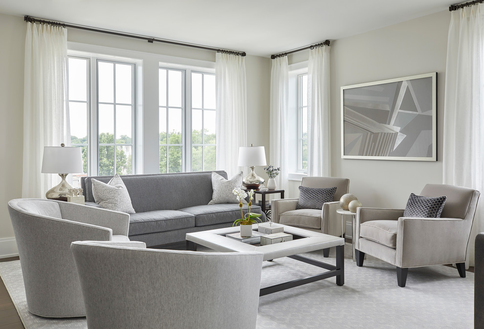 Photo of a transitional formal living room in New York with grey walls and no fireplace.