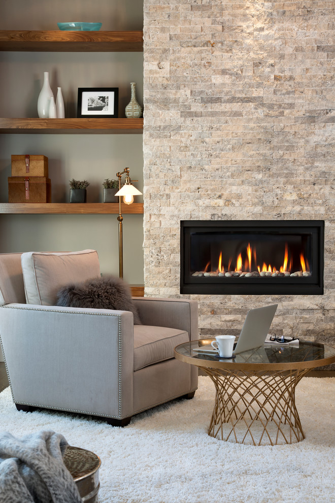Inspiration for a mid-sized transitional enclosed living room in Calgary with grey walls, vinyl floors, a standard fireplace and a stone fireplace surround.