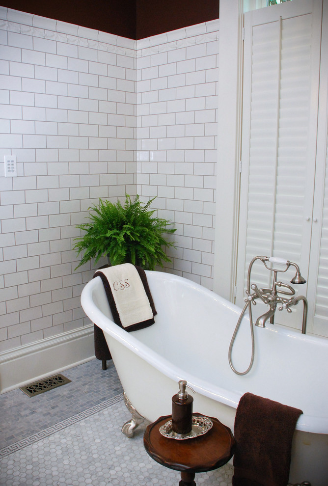 Inspiration for a mid-sized traditional master bathroom in Other with a claw-foot tub, white tile, subway tile and mosaic tile floors.