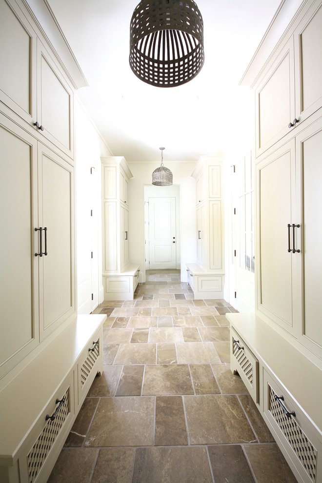 Photo of a traditional hallway in Atlanta with white walls and slate floors.