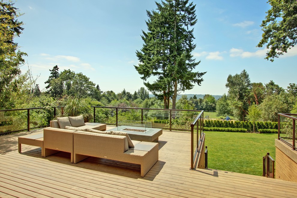 Design ideas for a contemporary deck in Seattle with a fire feature.