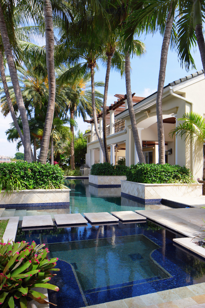 Design ideas for a beach style pool in Miami.