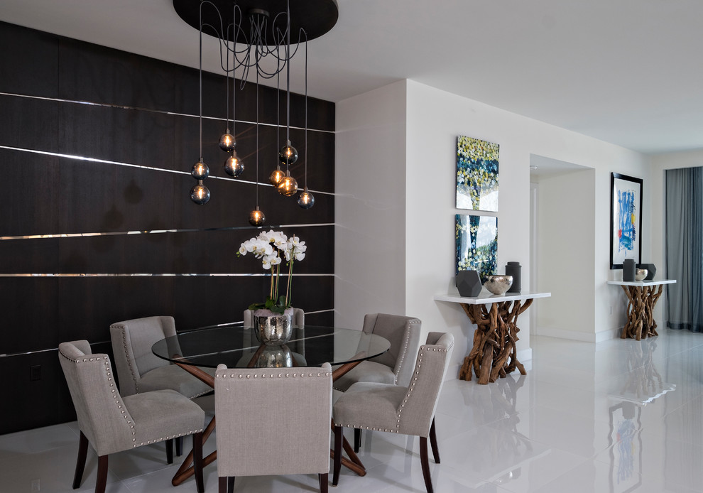 Inspiration for a contemporary open plan dining in Miami with metallic walls, no fireplace and white floor.