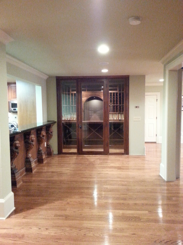 Example of a transitional wine cellar design in Austin