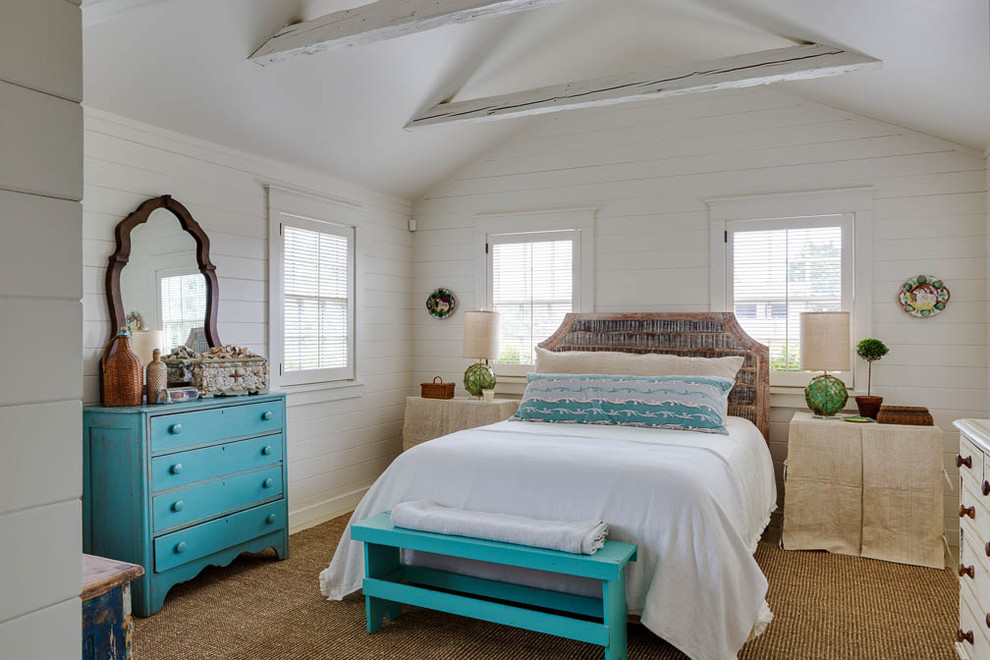 Inspiration for a small beach style master bedroom in Boston with white walls, light hardwood floors and no fireplace.