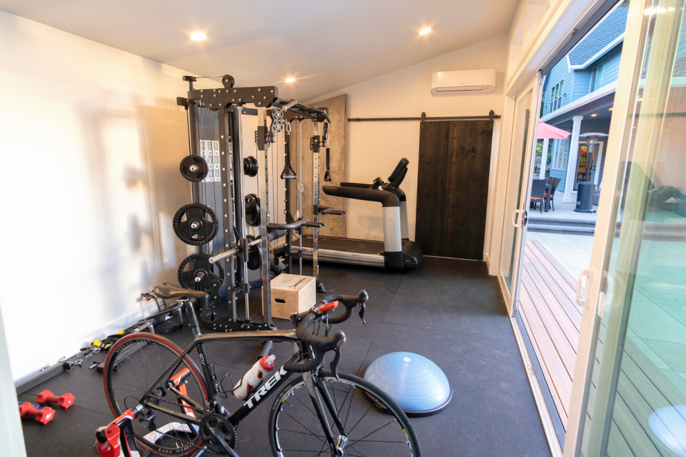 This is an example of a transitional home gym in Portland.