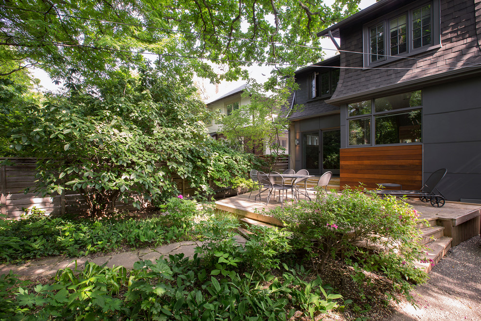 This is an example of a mid-sized contemporary backyard deck in Toronto.