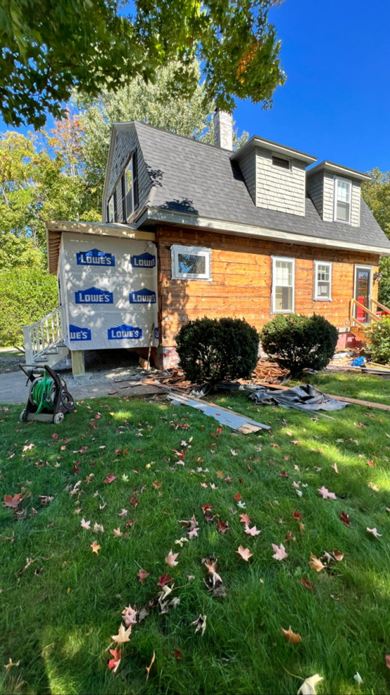 Four season room and vinyl siding