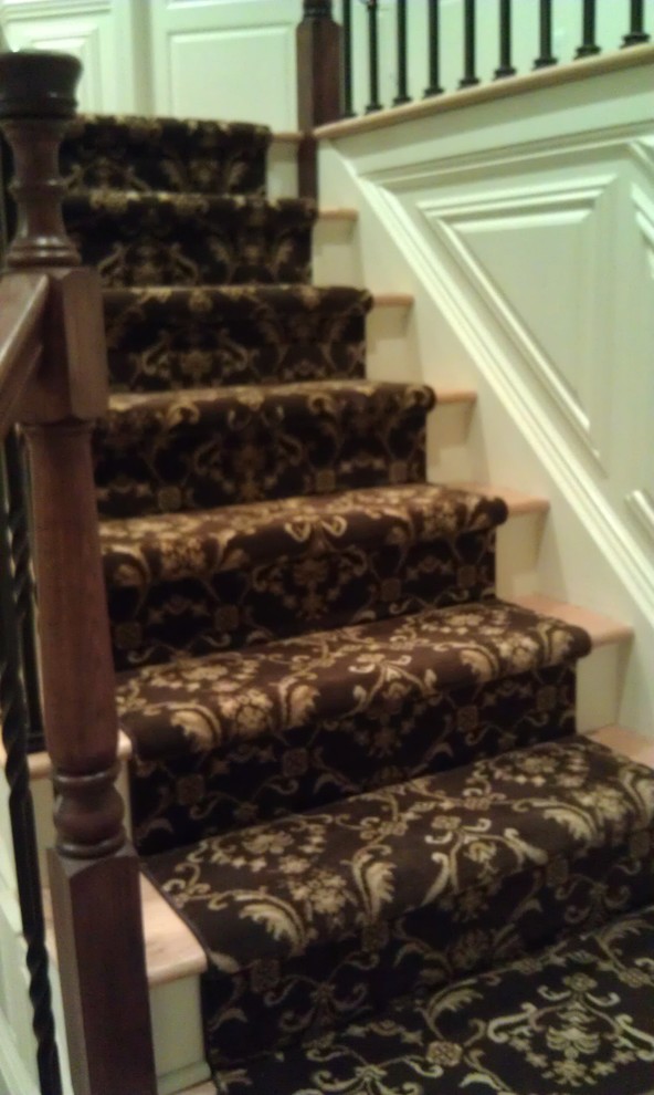 Design ideas for a large traditional straight staircase in New York.