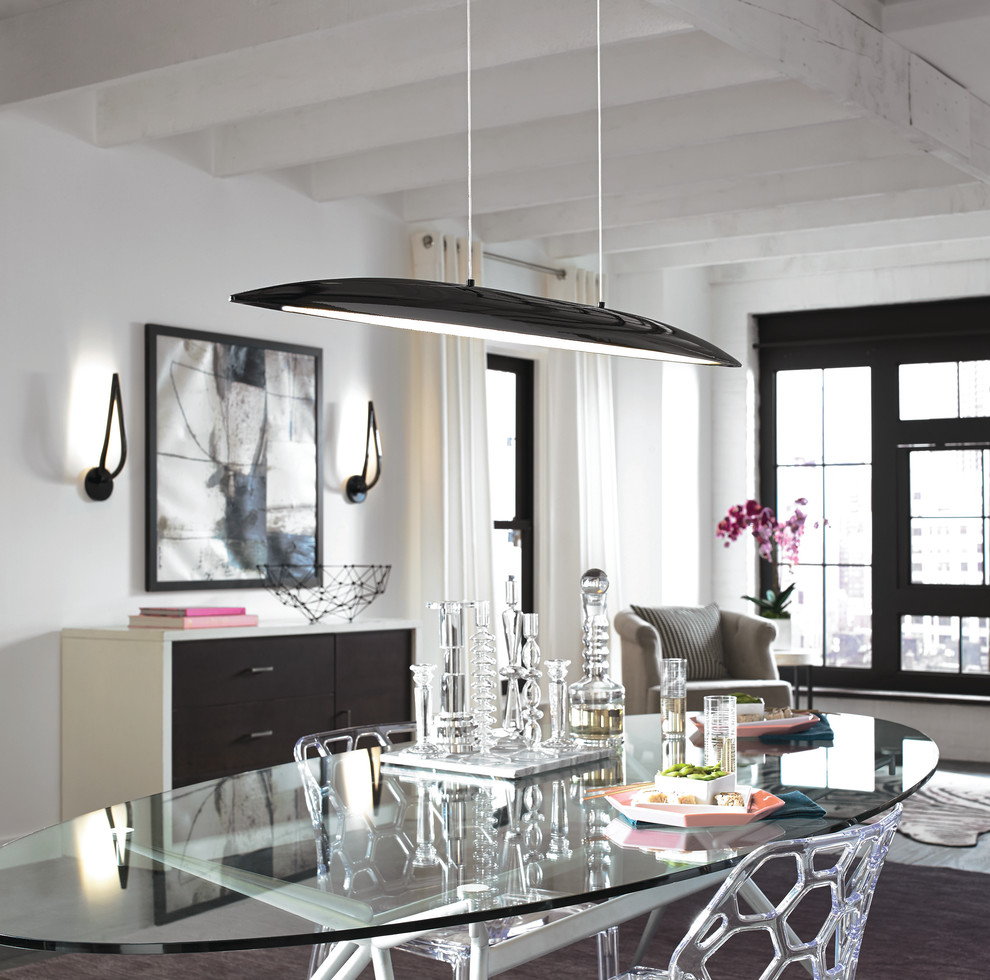 This is an example of a mid-sized modern open plan dining in New York with white walls and light hardwood floors.