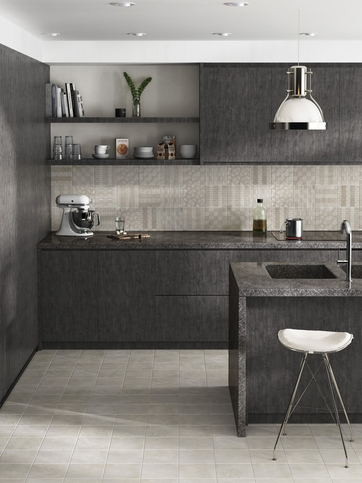 Inspiration for a small industrial galley kitchen in Other with a double-bowl sink, flat-panel cabinets, grey cabinets, granite benchtops, grey splashback, cement tiles, a peninsula and beige floor.
