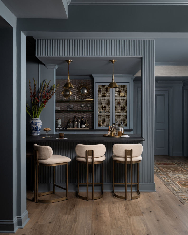 Example of a transitional home bar design in Atlanta