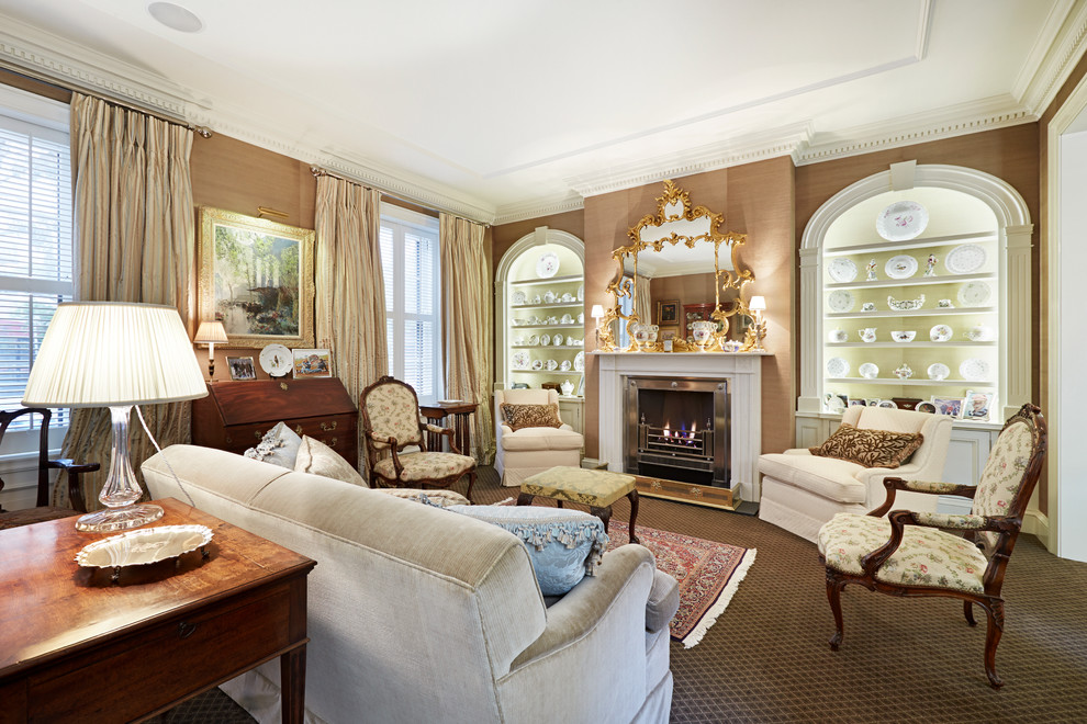 This is an example of a traditional enclosed living room in Brisbane with brown walls, carpet, a standard fireplace, a stone fireplace surround and no tv.