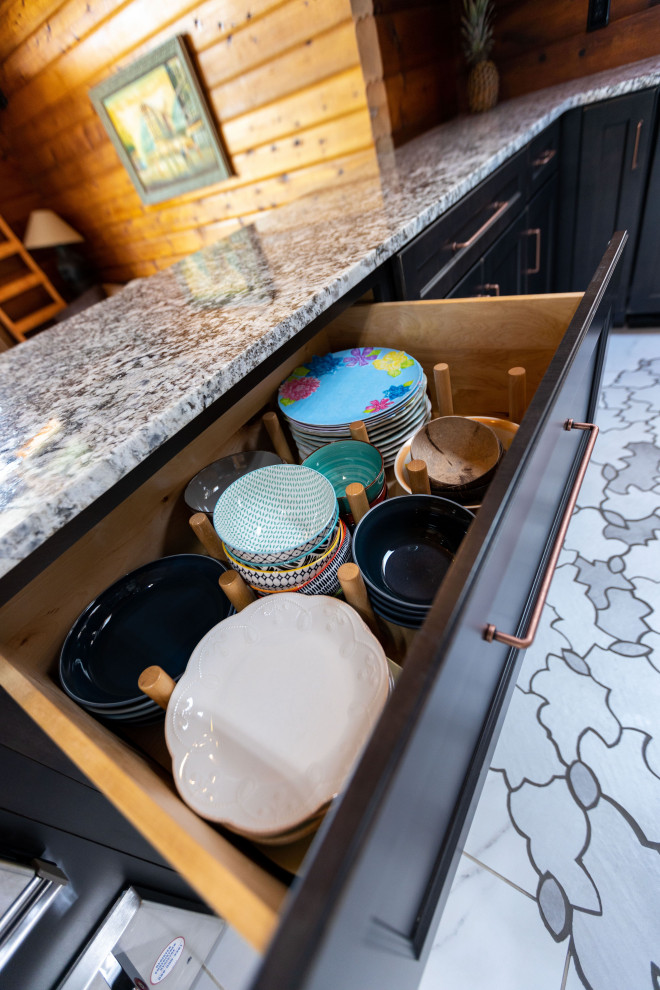 Eat-in kitchen - mid-sized rustic u-shaped ceramic tile, multicolored floor and wood ceiling eat-in kitchen idea with a farmhouse sink, shaker cabinets, distressed cabinets, granite countertops, gray backsplash, mosaic tile backsplash, stainless steel appliances, no island and multicolored countertops