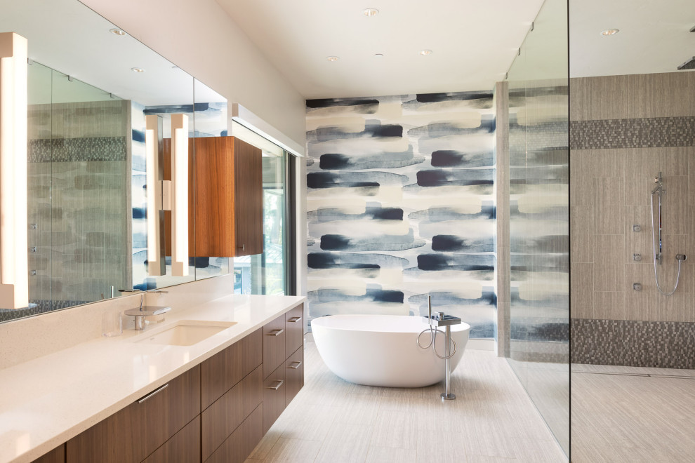 Inspiration for a contemporary master bathroom in Portland with flat-panel cabinets, medium wood cabinets, a freestanding tub, white walls, an undermount sink, beige floor, white benchtops, a single vanity and a floating vanity.