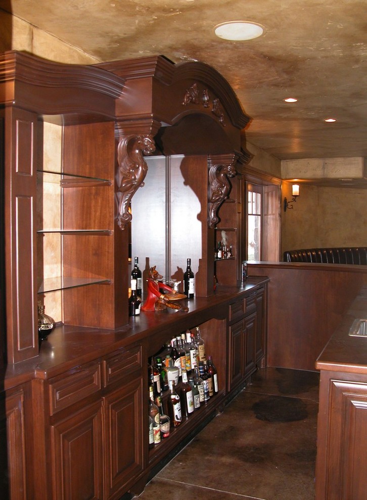 Inspiration for a mid-sized traditional home bar in Other.