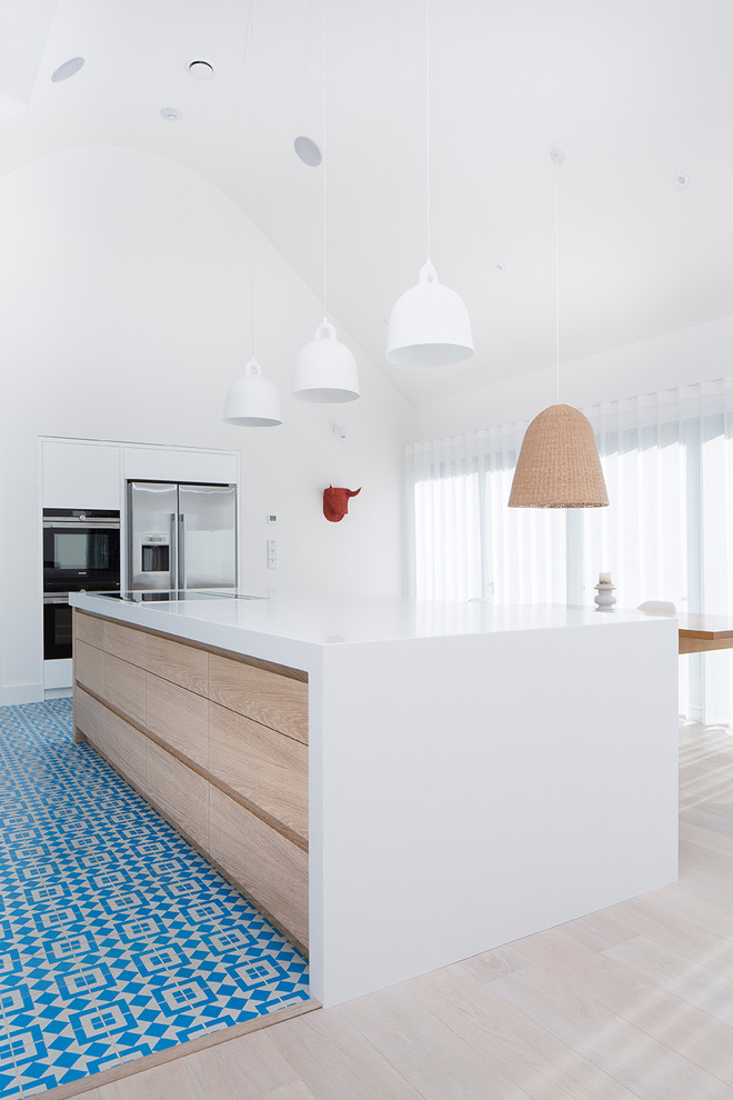 Inspiration for a contemporary kitchen in Other with with island.