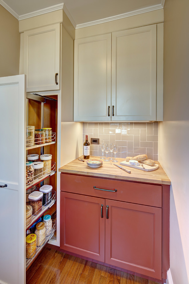 Design ideas for a mid-sized arts and crafts u-shaped separate kitchen in New York with a farmhouse sink, shaker cabinets, red cabinets, quartz benchtops, ceramic splashback, stainless steel appliances, light hardwood floors, no island and brown floor.