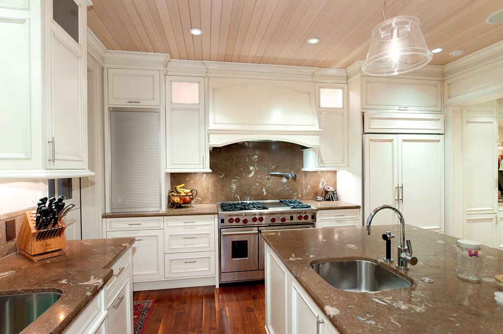 Traditional kitchen in Vancouver with stainless steel appliances.