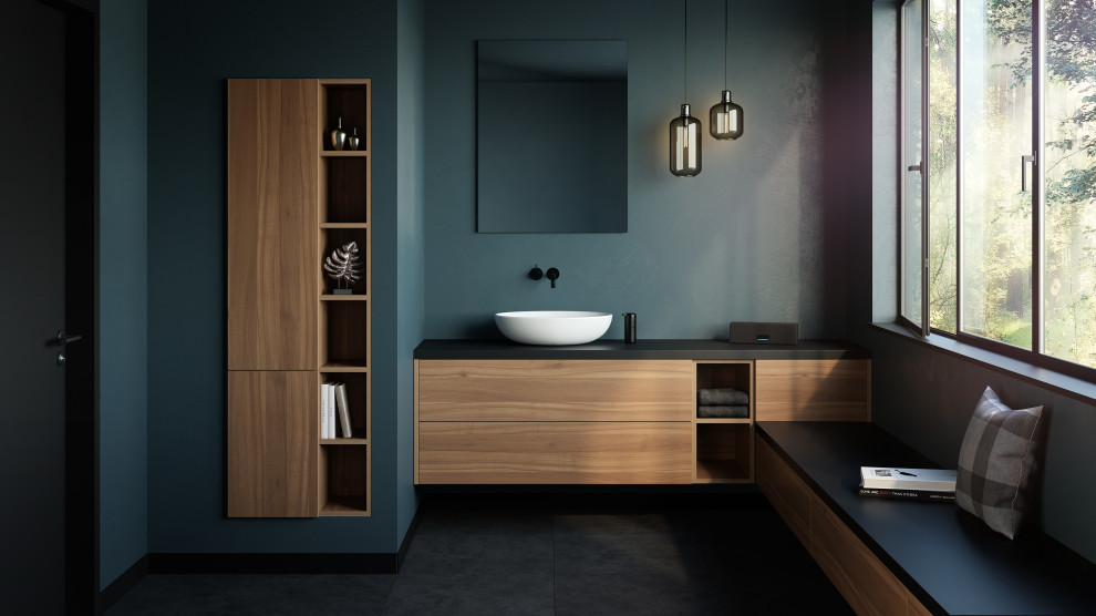 Design ideas for a mid-sized contemporary master bathroom in Frankfurt with flat-panel cabinets, dark wood cabinets, blue walls, ceramic floors, a vessel sink, limestone benchtops, black floor, black benchtops, a single vanity and a freestanding vanity.