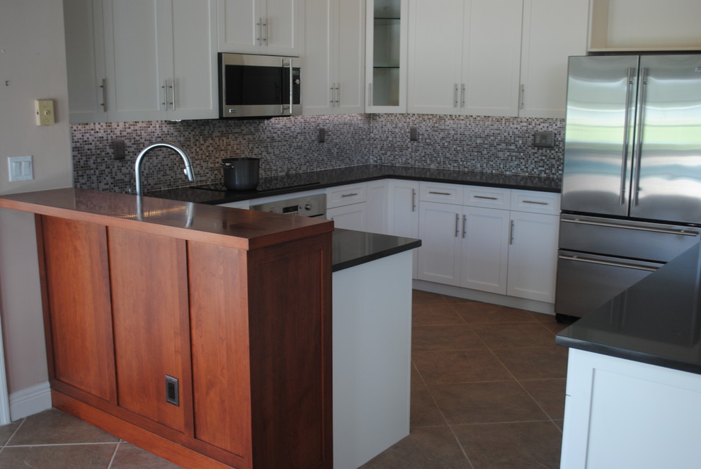 Example of a mid-sized transitional kitchen design in Miami