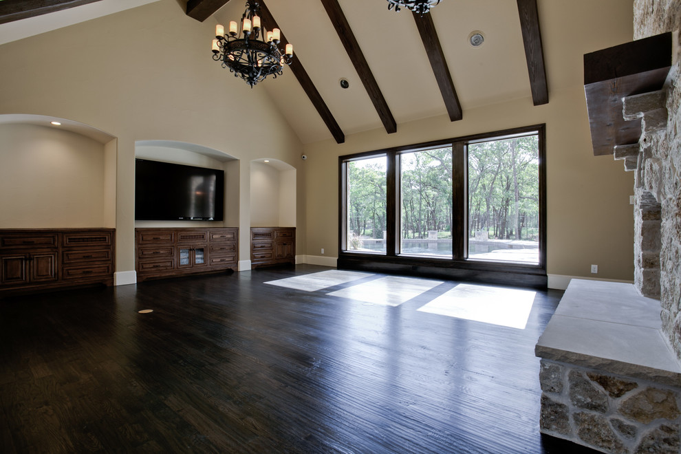 This is an example of a large mediterranean living room in Dallas with green walls, ceramic floors and no fireplace.
