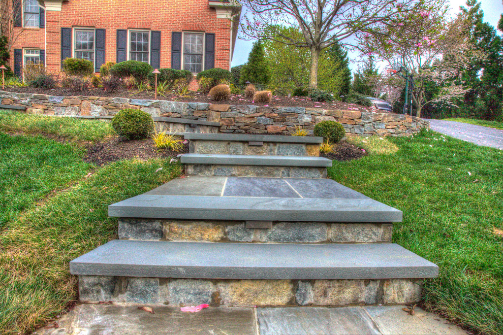 This is an example of a large front yard retaining wall landscape in DC Metro.