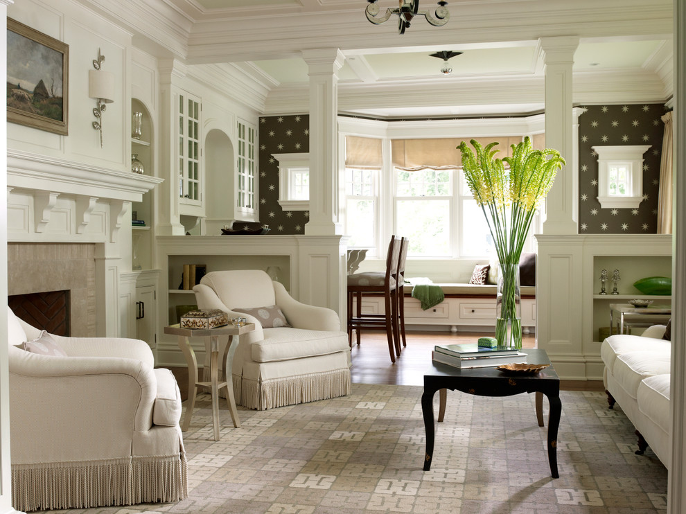 Inspiration for a timeless dark wood floor living room remodel in New York with white walls and a standard fireplace