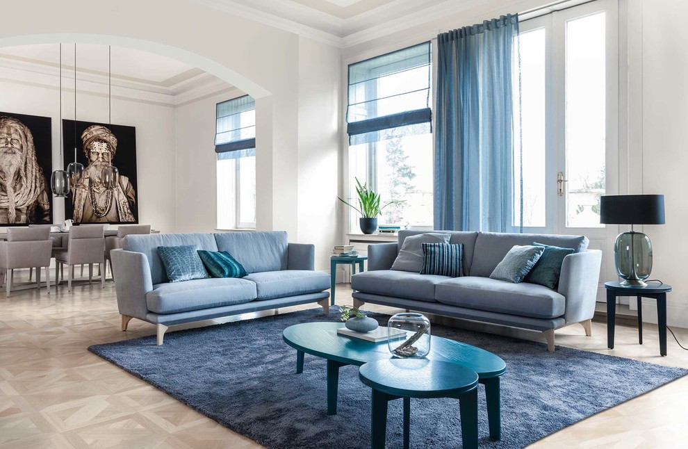 Design ideas for a large scandinavian open concept living room in Stuttgart with white walls, light hardwood floors, no fireplace, no tv and beige floor.