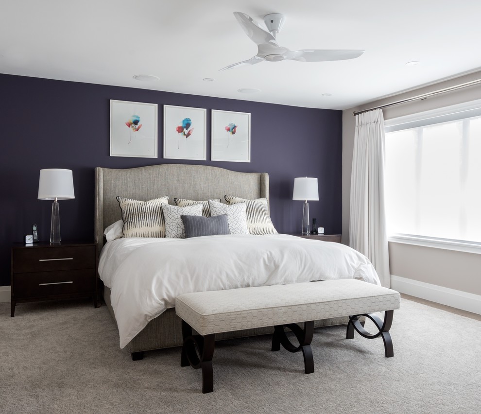 Design ideas for a mid-sized transitional master bedroom in Toronto with grey walls, medium hardwood floors and grey floor.