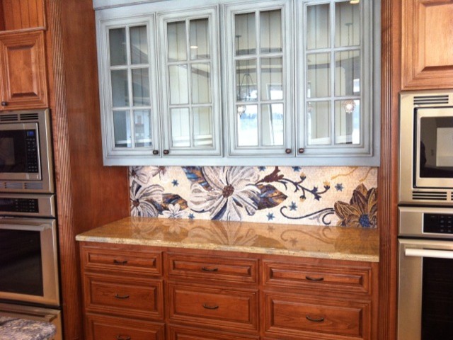 Inspiration for a contemporary kitchen remodel with multicolored backsplash and mosaic tile backsplash