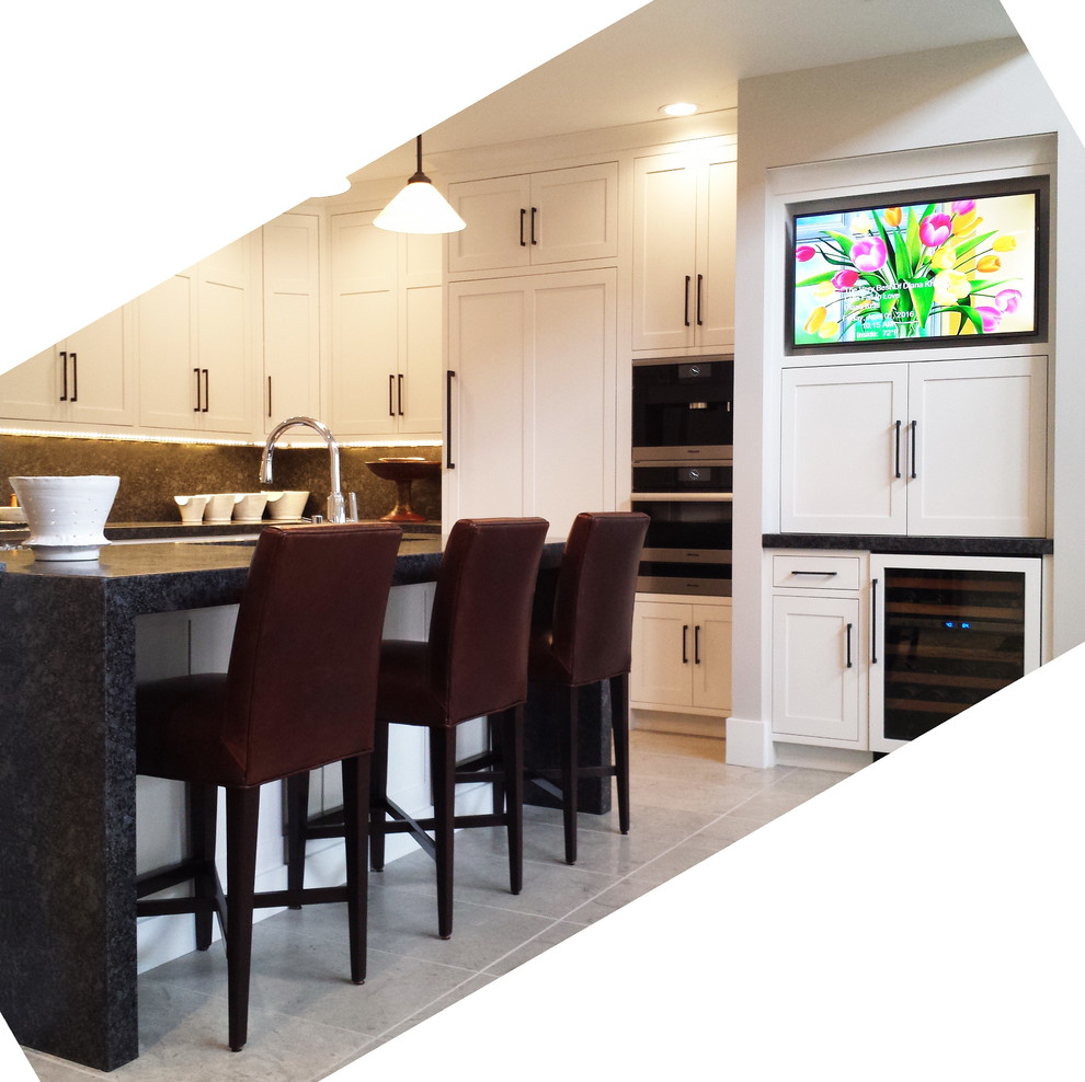 Inspiration for a mid-sized transitional l-shaped concrete floor and beige floor eat-in kitchen remodel with an undermount sink, shaker cabinets, white cabinets, granite countertops, black backsplash, stone slab backsplash, paneled appliances and a peninsula