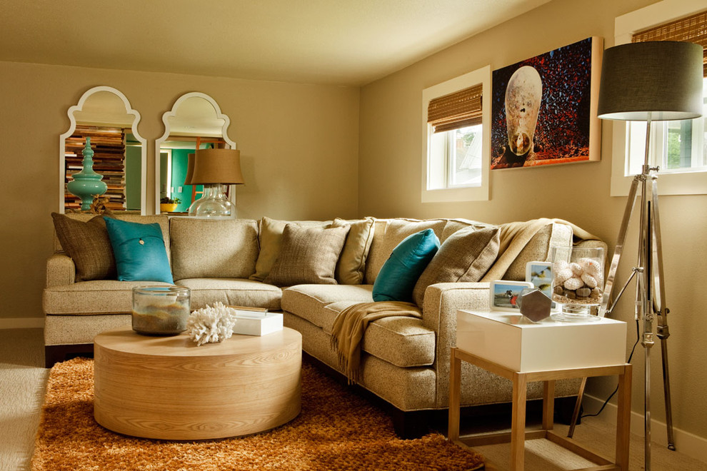 This is an example of a beach style living room in Portland with beige walls.