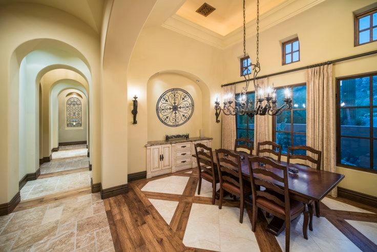 Inspiration for an expansive transitional kitchen/dining combo in Phoenix with beige walls, travertine floors and no fireplace.