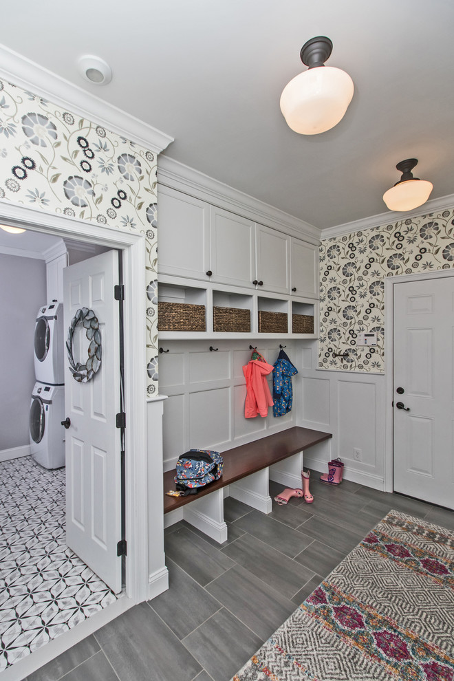 Inspiration for a mid-sized eclectic mudroom in Philadelphia with multi-coloured walls, a single front door, a white front door, grey floor and ceramic floors.