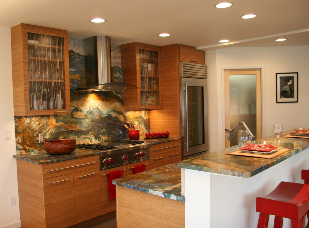 Design ideas for an asian kitchen in Other with glass-front cabinets and granite benchtops.