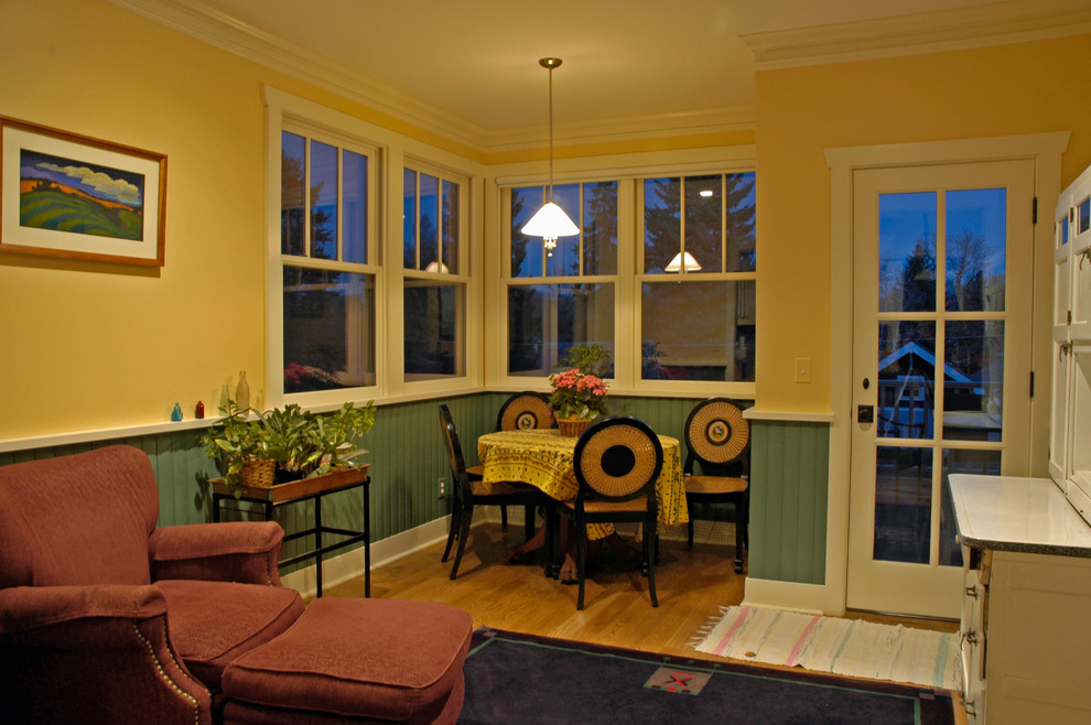 Photo of an arts and crafts dining room in Other.