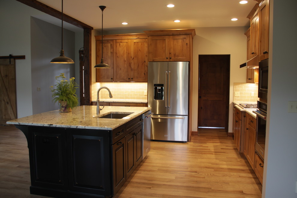 Inspiration for a rustic kitchen remodel in Grand Rapids
