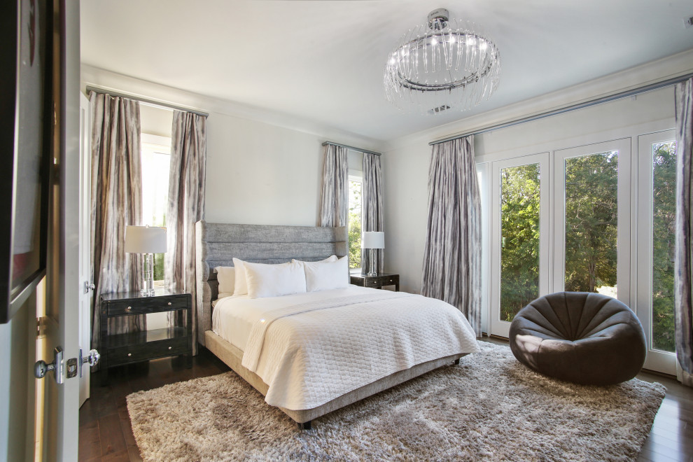 Design ideas for a large transitional master bedroom in New Orleans with white walls, marble floors, white floor and vaulted.