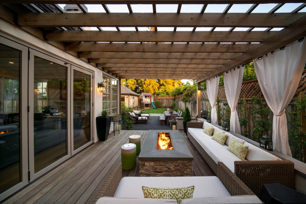 Inspiration for a mid-sized contemporary backyard partial sun formal garden for spring in San Francisco with decking.