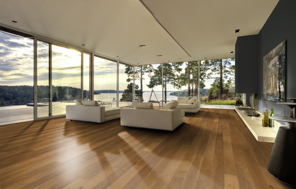 Design ideas for a country open concept living room in San Francisco with grey walls and light hardwood floors.